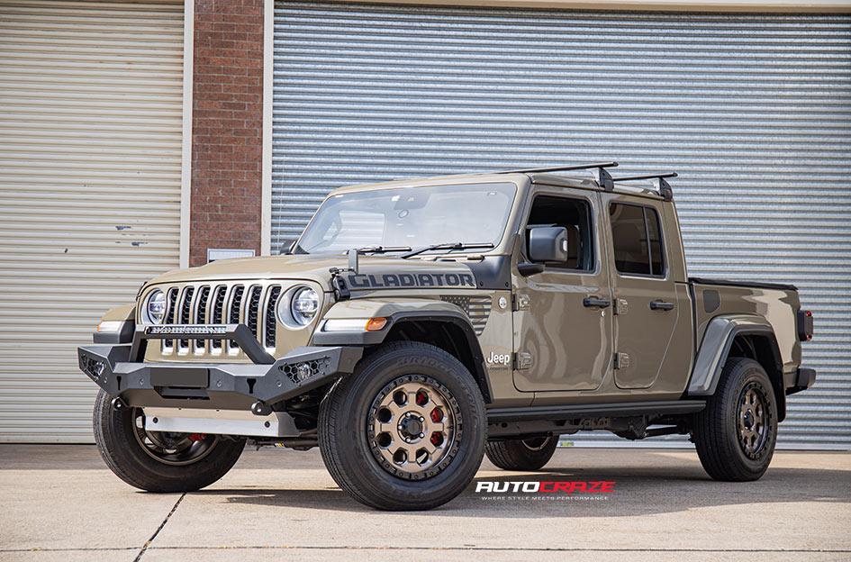 Jeep Gladiator Ute Pickup with American Racing AR201 Matte Bronze Black Lip wheels front gallery view