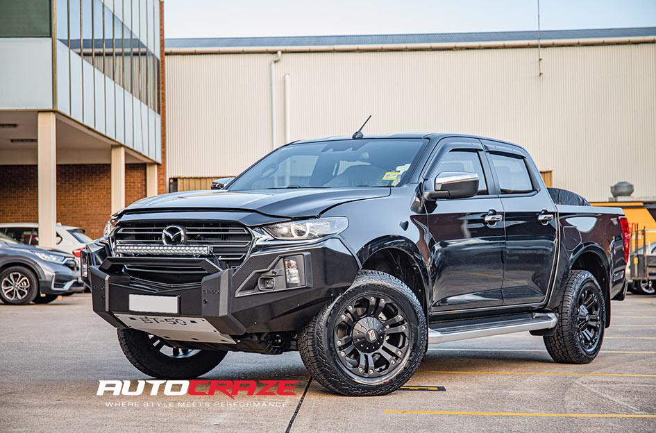 Mazda BT-50 with KMC Monster matte black wheels and off-road tyres