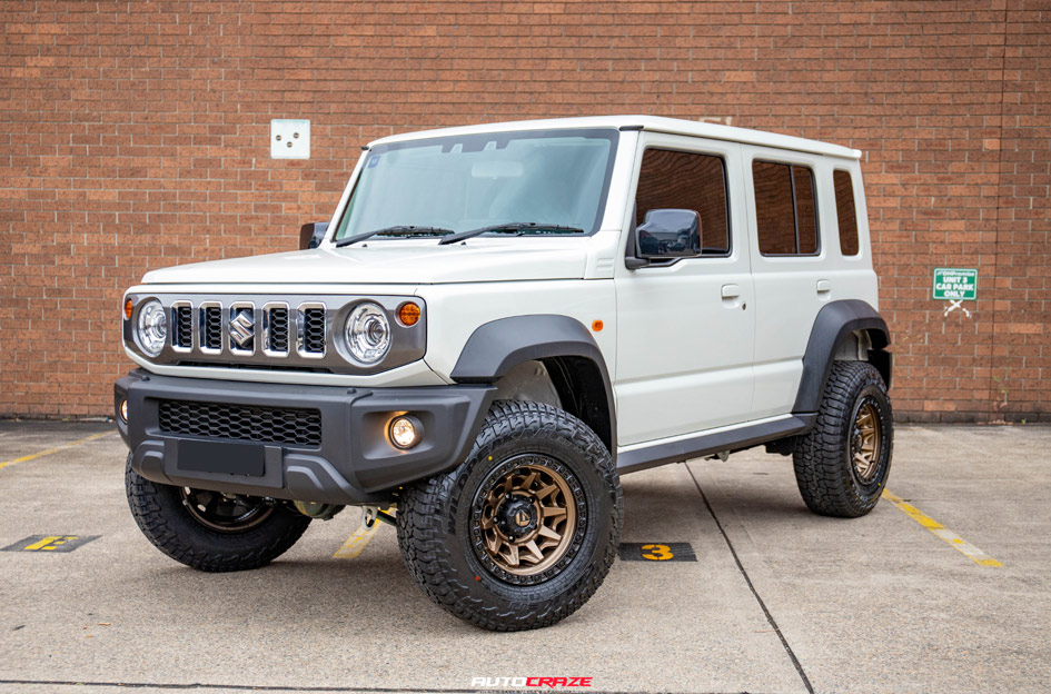 Lifted Suzuki Jimny featuring Fuel wheels and touring accessories