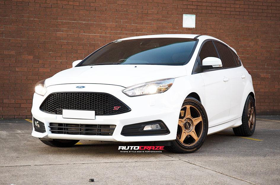 FORD FOCUS 5 STUD ALPINE BRONZE W BLACK LIP WHEELS