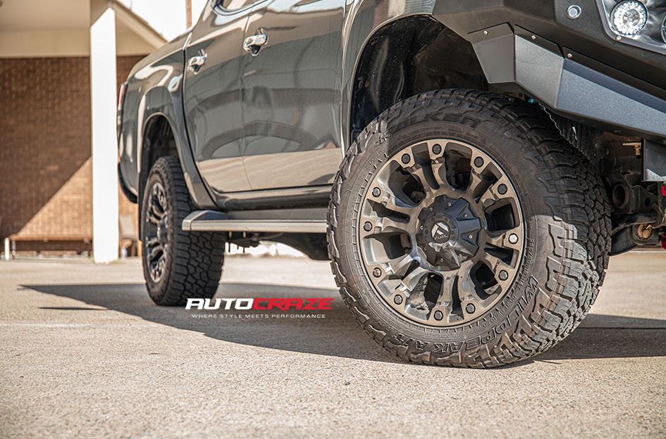 MITSUBISHI TRITON VAPOR BLACK MACHINED WITH DARK TINT