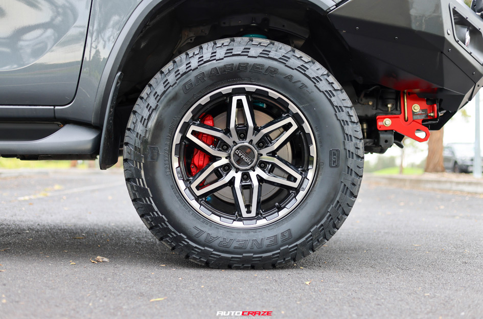 TOYOTA FORTUNER NOMAD N232 GLOSS BLACK DARK TINT