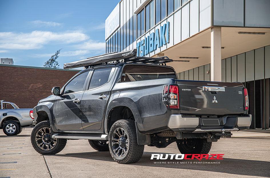 MITSUBISHI TRITON VAPOR BLACK MACHINED WITH DARK TINT