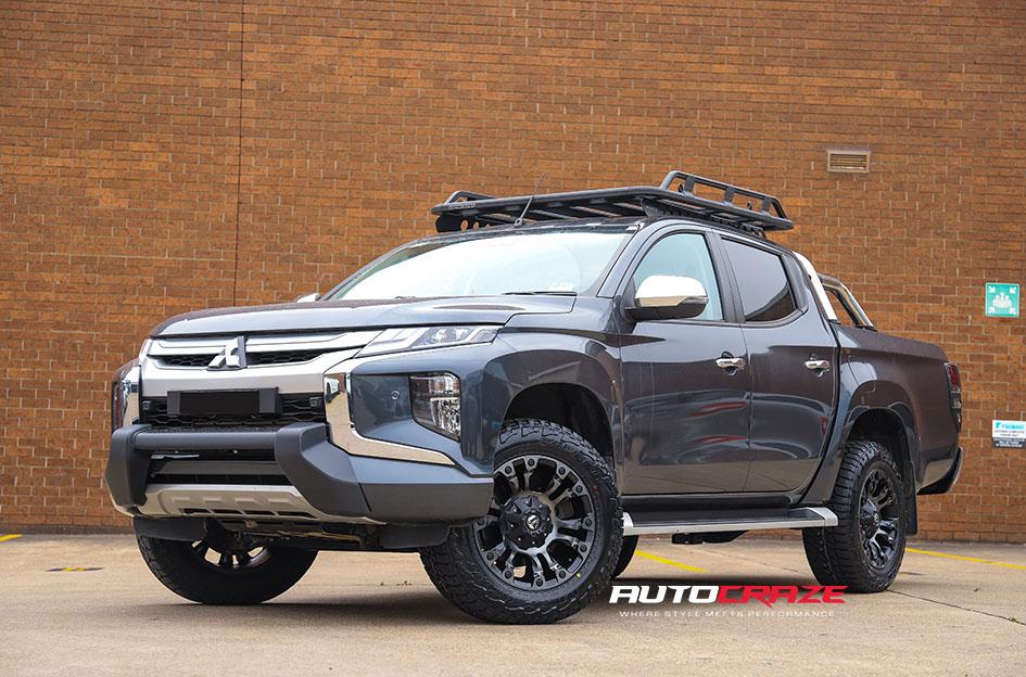 MITSUBISHI TRITON VAPOR BLACK MACHINED WITH DARK TINT