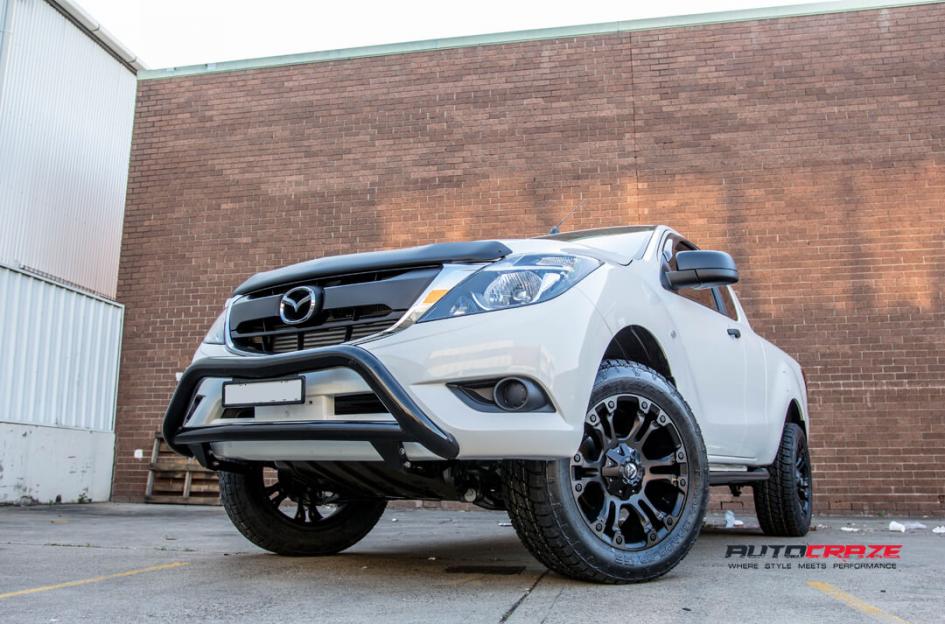 MAZDA BT 50 VAPOR BLACK MACHINED WITH DARK TINT