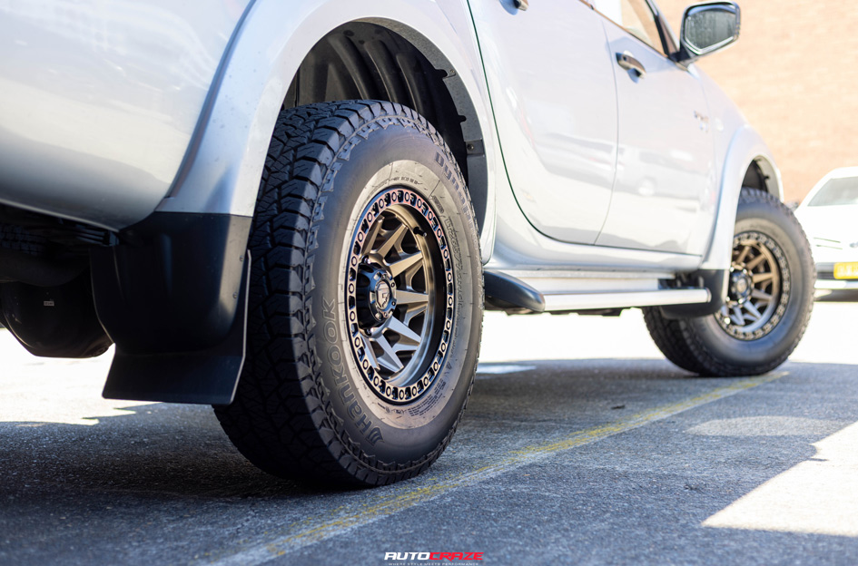 MITSUBISHI TRITON FUEL COVERT BRONZE BLACK RING