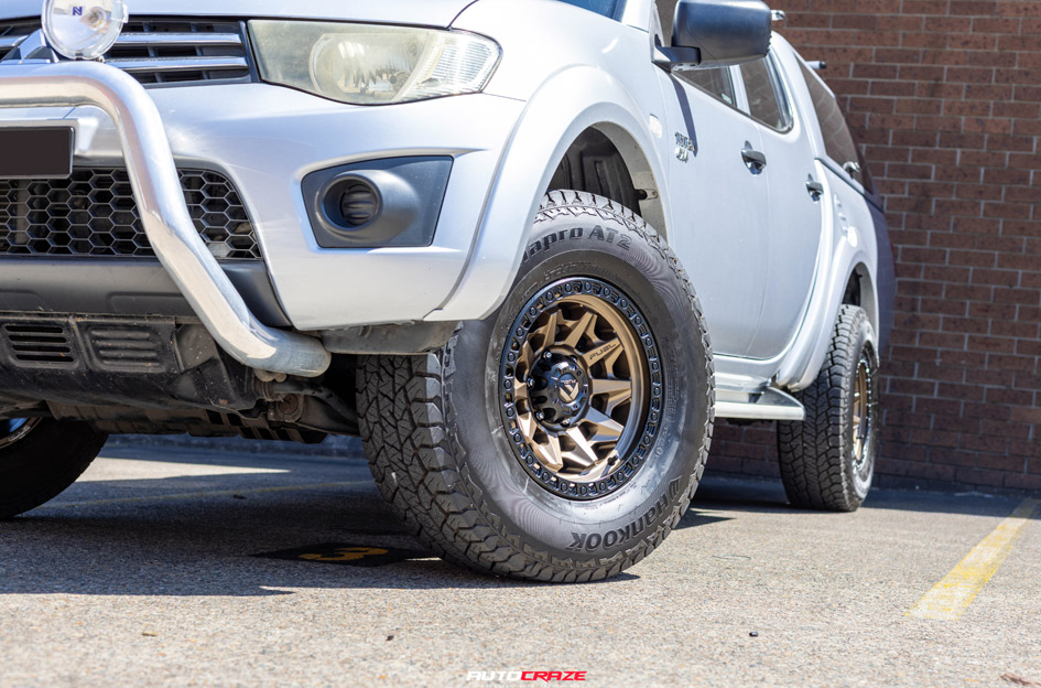 MITSUBISHI TRITON FUEL COVERT BRONZE BLACK RING