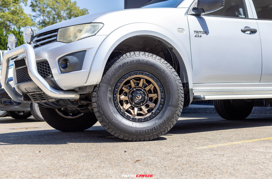 MITSUBISHI TRITON FUEL COVERT BRONZE BLACK RING