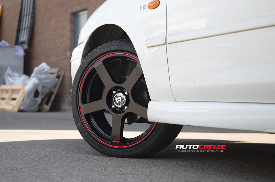 FORD LASER MOTEGI MR116 MATTE BLACK RED STRIPE