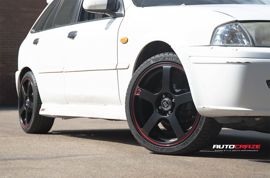 FORD LASER MOTEGI MR116 MATTE BLACK RED STRIPE