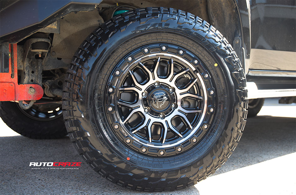MITSUBISHI TRITON FUEL SURGE GLOSS BLACK GRAY TINT