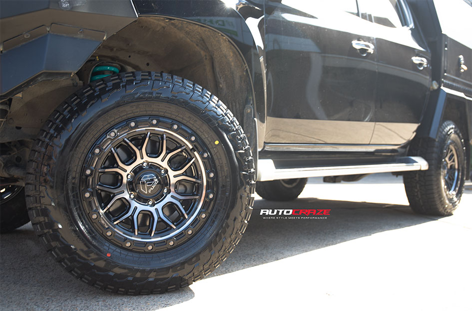 MITSUBISHI TRITON FUEL SURGE GLOSS BLACK GRAY TINT