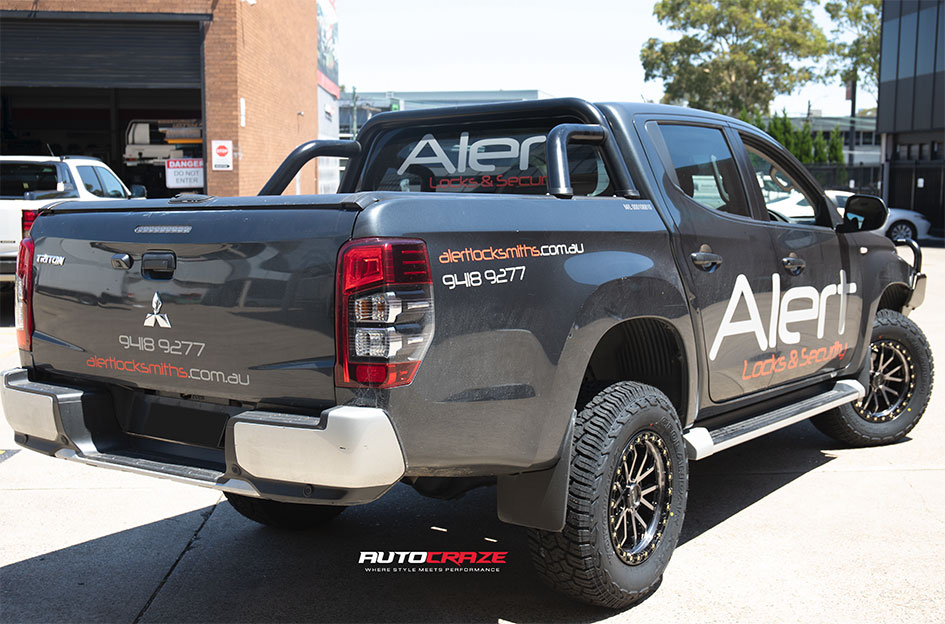 MITSUBISHI TRITON NOMAD N133 GLOSS BLACK DARK TINT