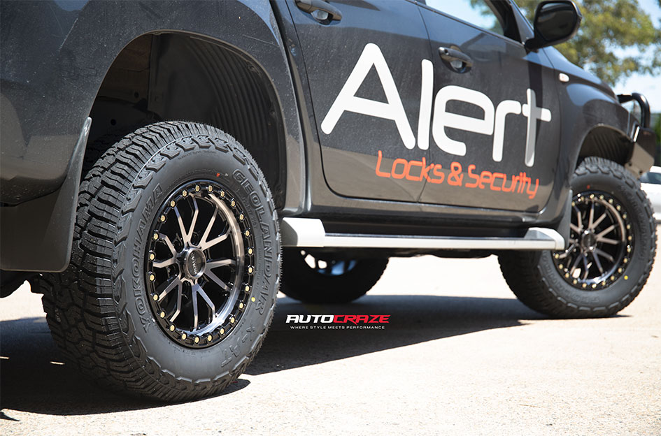 MITSUBISHI TRITON NOMAD N133 GLOSS BLACK DARK TINT