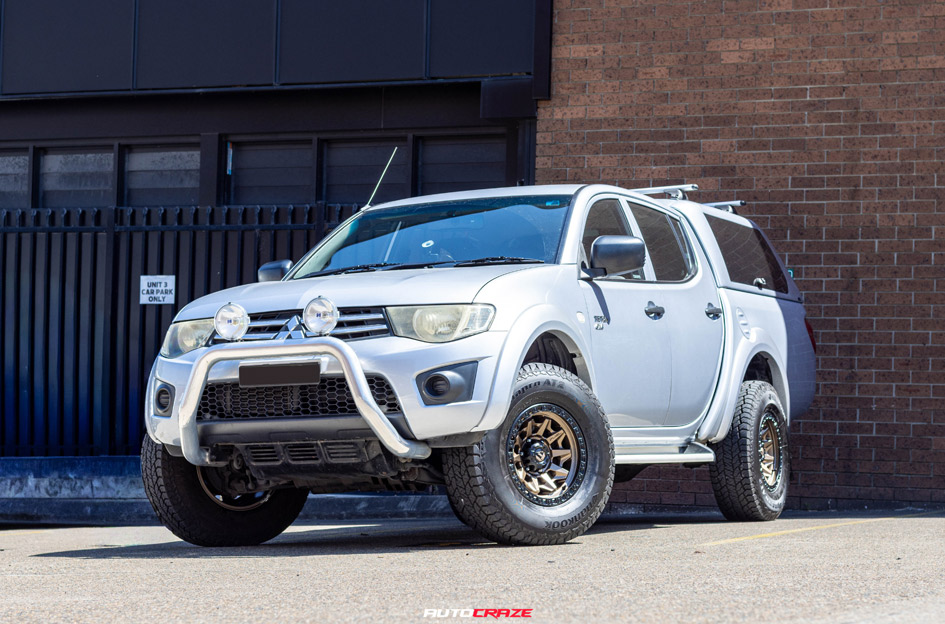 MITSUBISHI TRITON FUEL COVERT BRONZE BLACK RING