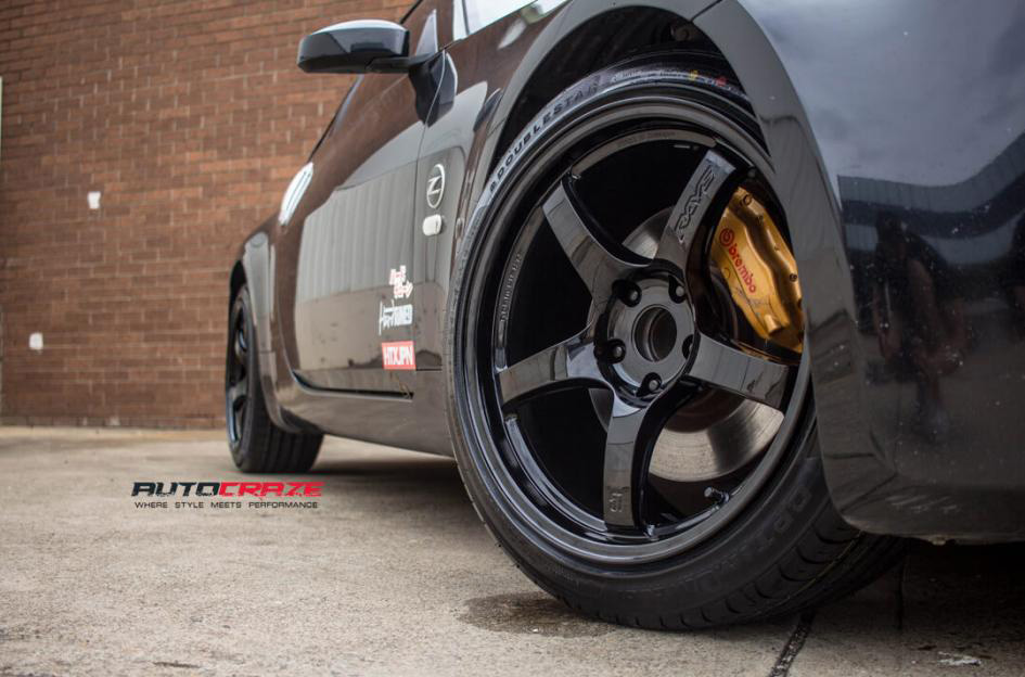 Black Nissan 350z Rays Gram Light 57CR Wheels Gloss Black Finish close up fitment shot