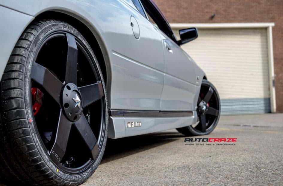 Holden Commodore with KMC wheels and Michellin tyre rear wheel close up shot february 2018
