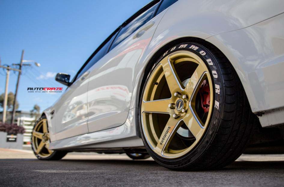 Holden Commodore with Simmons FRCS Gold wheel and Achilles tyre rear wheel close up shot february 2018