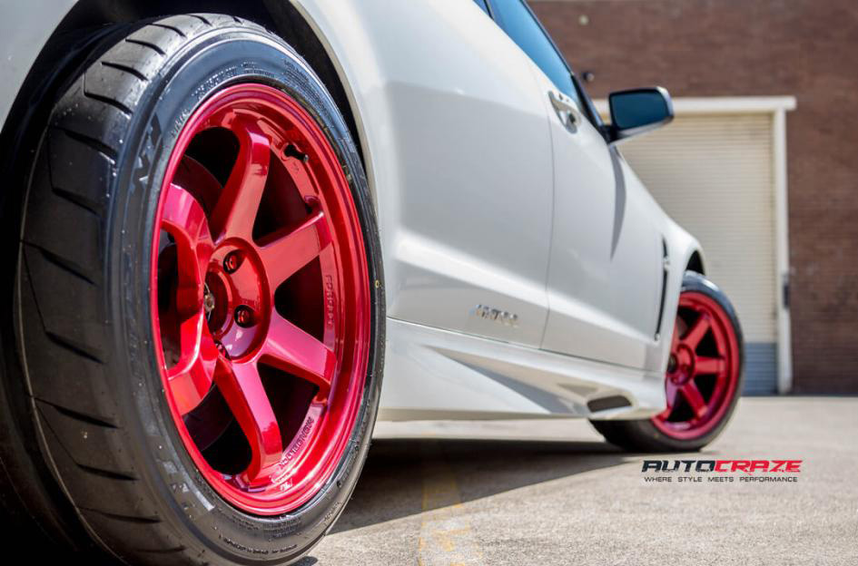 White Holden HSV Maloo Rays TE37SL Hyper Red wheels Nitto tyres rear fitment shot