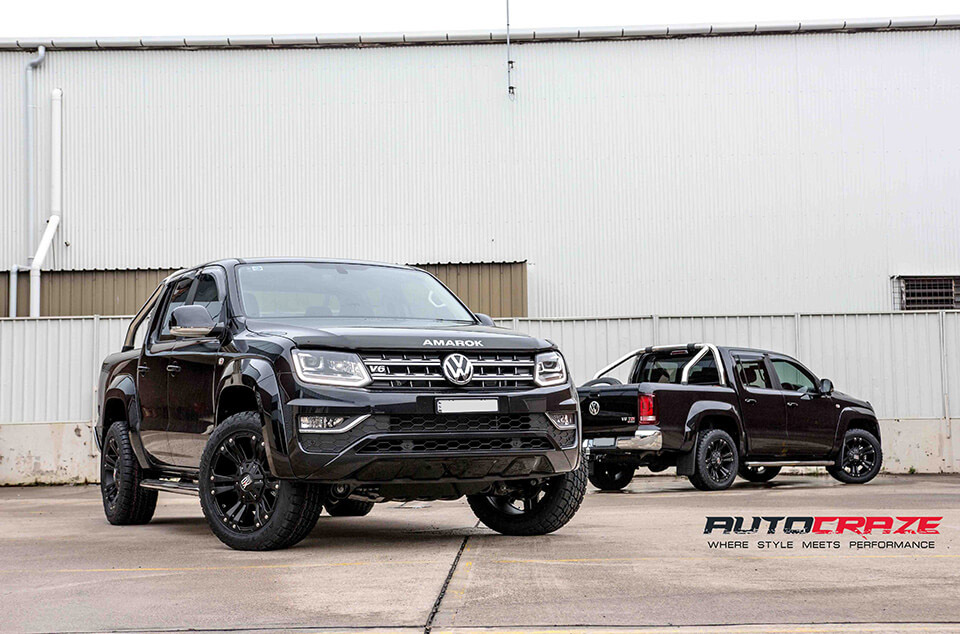 Black Volkswagen Amarok KMC Monster 2 4x4 wheels Nitto tyres front shot