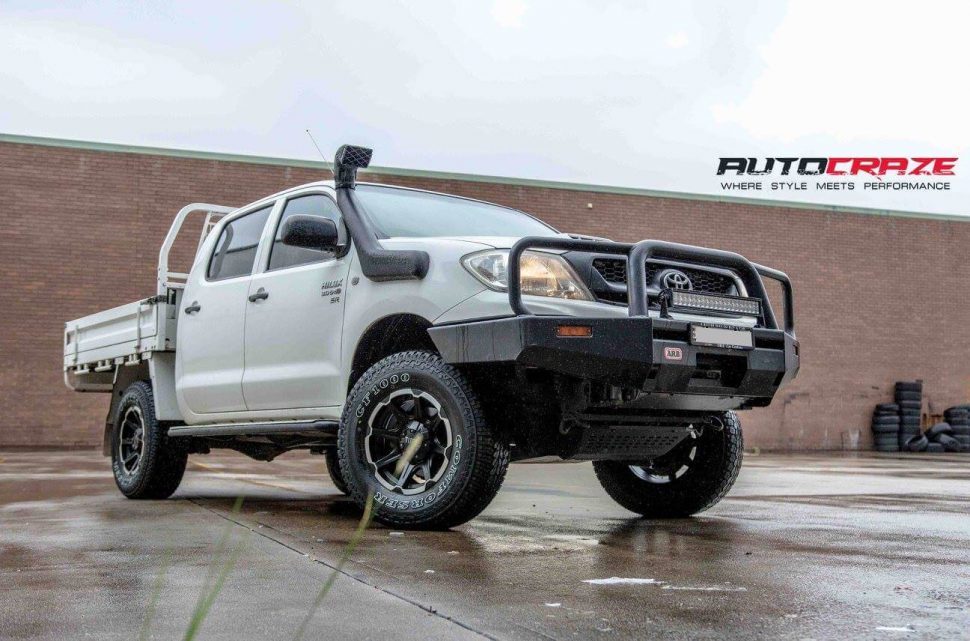 White Toyota Hilux Tuff T05 wheels front shot