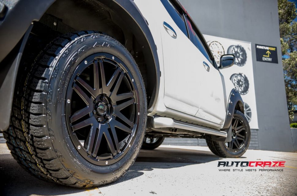 Nissan Navara PDW Rampage Wheels Nitto Terra Grappler Tyres Tail Light Covers Rear Fitment Close Up Shot 2018