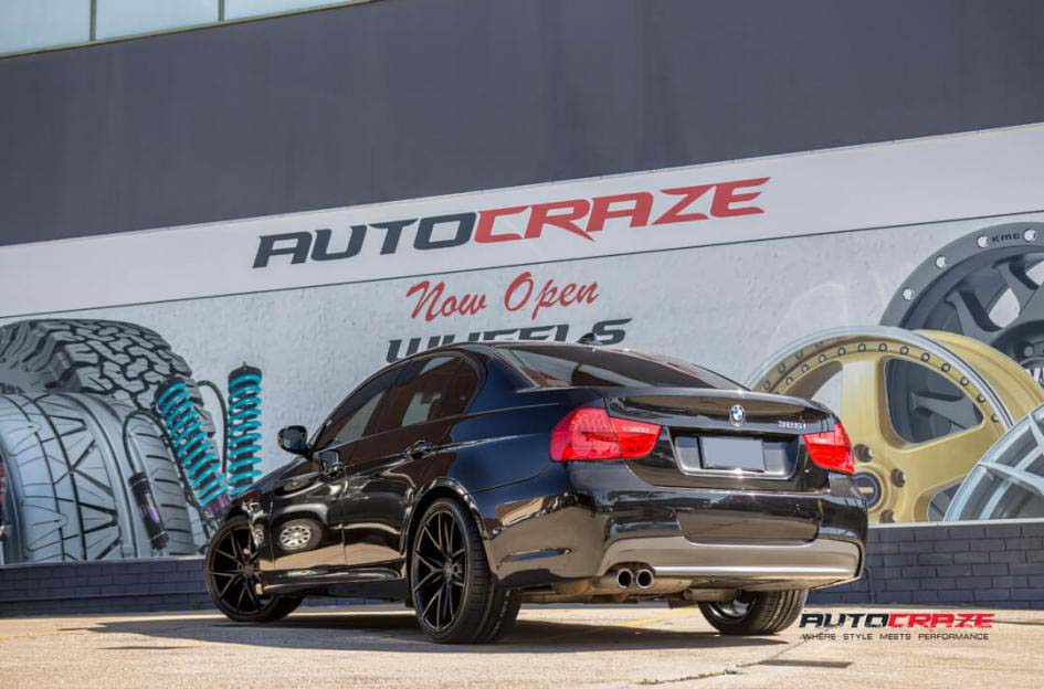 BMW 3 series with Niche Misano wheels and Kumho tyre rear wide angle shot february 2018