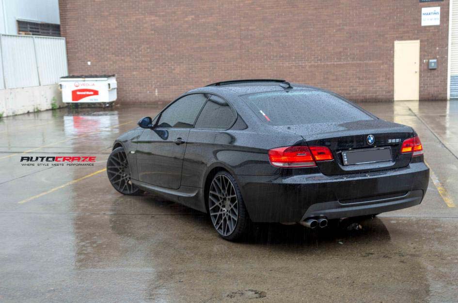 BMW 3 series with rotiform blq wheels and Kumho tyre rear wide angle shot february 2018