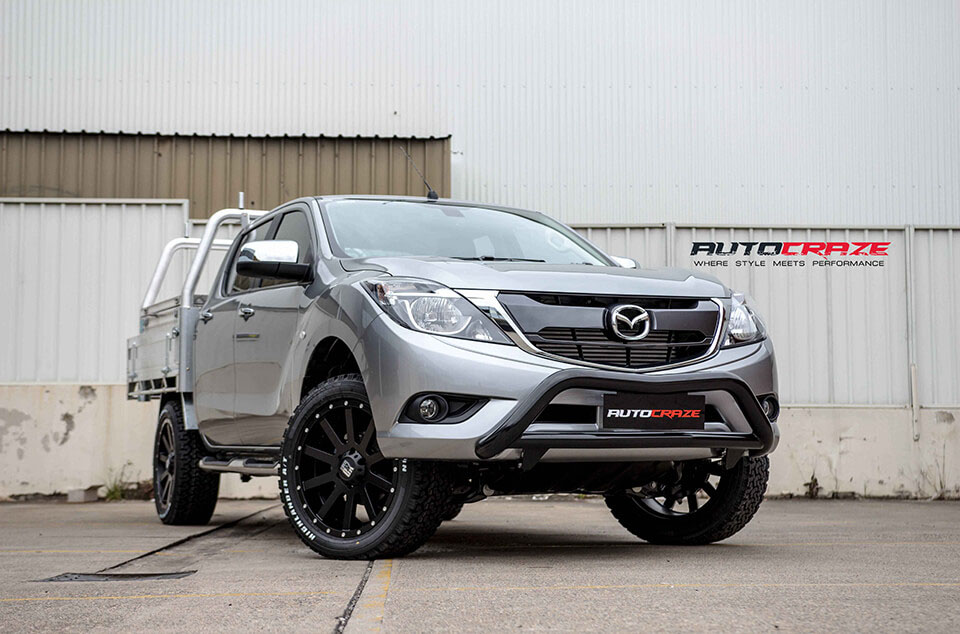Silver Mazda BT50 KMC Heist Satin Black 4x4 wheels front shot
