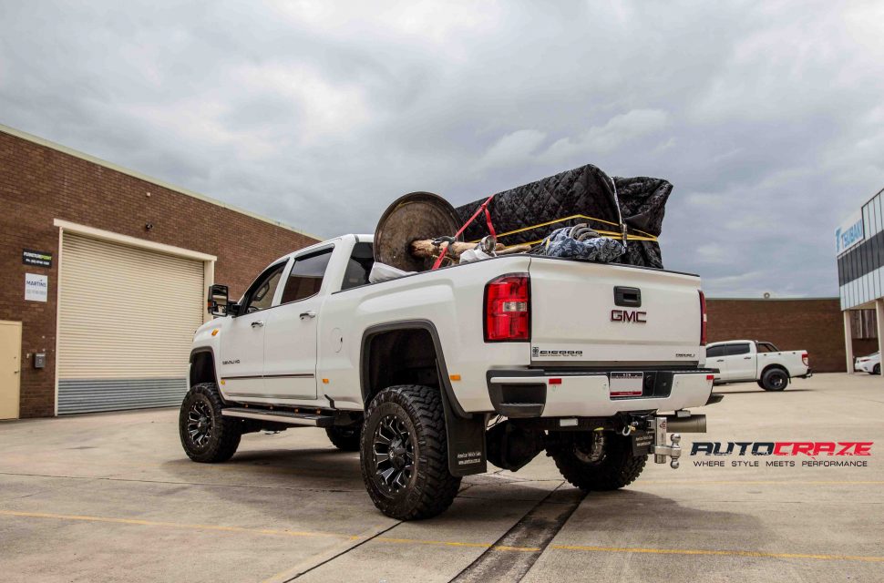 GMC Sierra with Fuel Assault wheel and nitto trail grappler tyre rear wide angle shot march 2018