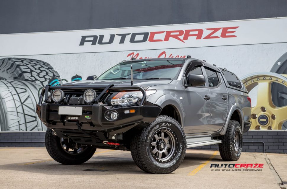 Mitsubishi triton fuel trophy wheel dobinsons lift kit front angle shot may 2018