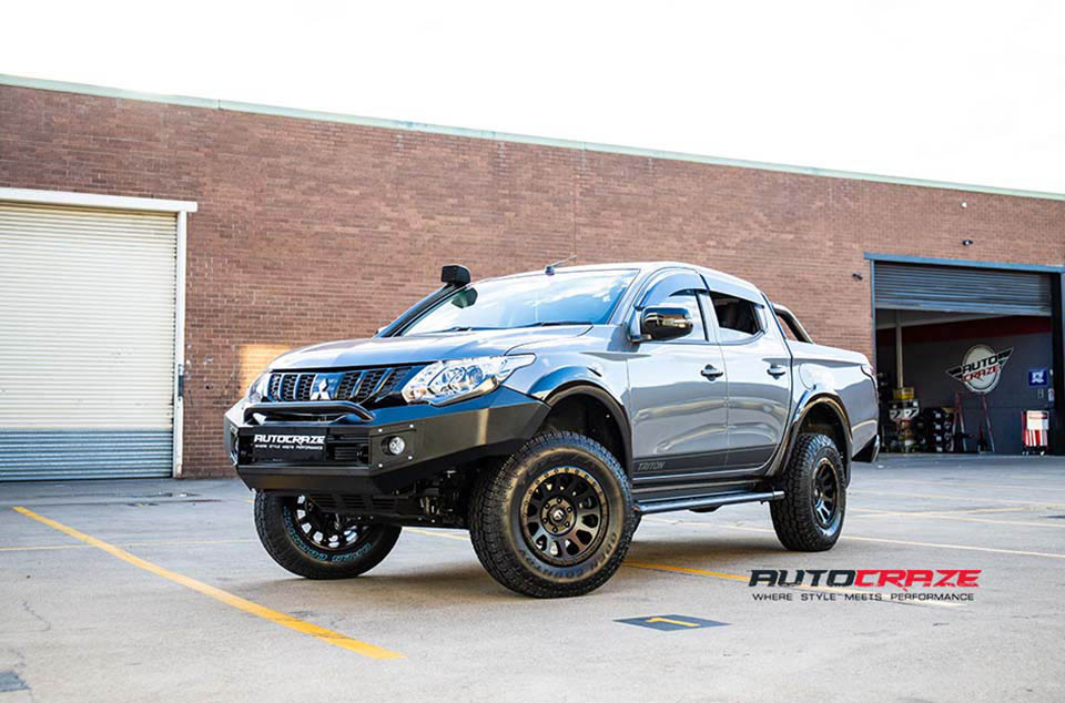 Grey Mitsubishi Triton Roller Shutter Fuel Vector Wheels Front Close Shot August 2018